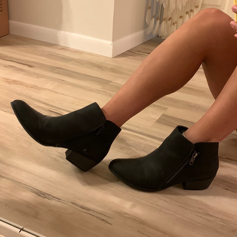 Black ankle booties. Lightly used.